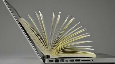 Middle laptop book information online computer data