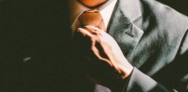 Big tie necktie adjust adjusting man business