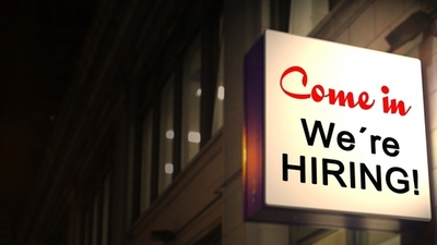 Middle building neon sign communication job job offer