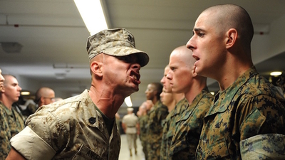Middle military recruiting shouting at the cadet