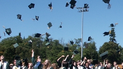 Middle graduation teen high school student graduate